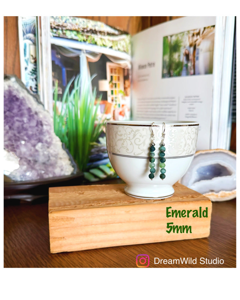 Emerald dangle earrings. May birthstone
